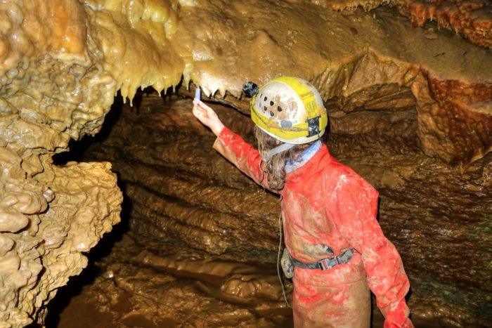 Collecting water samples in the Bleßberg cave, Thuringia, during fieldwork